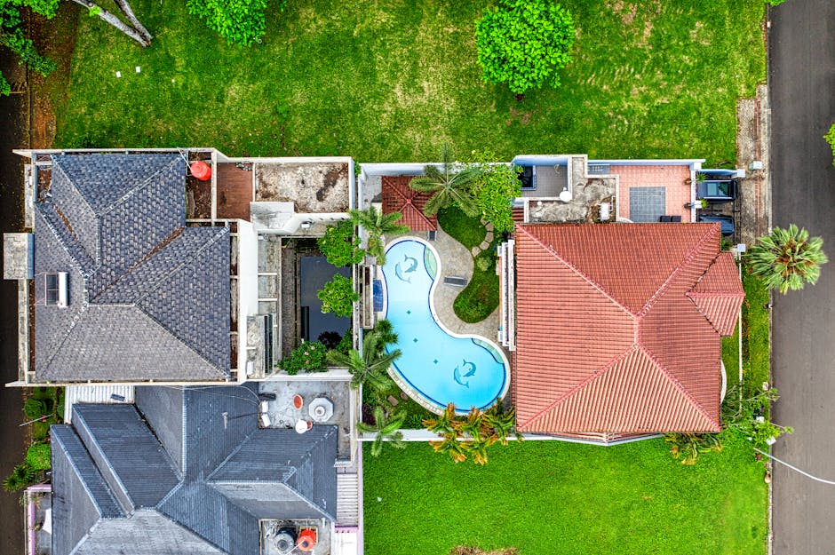 Aerial photograph showcasing luxurious homes and a pool in Banten, Indonesia